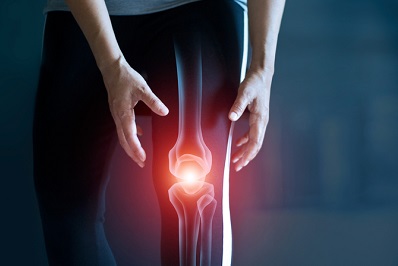 person holding painful knee joint